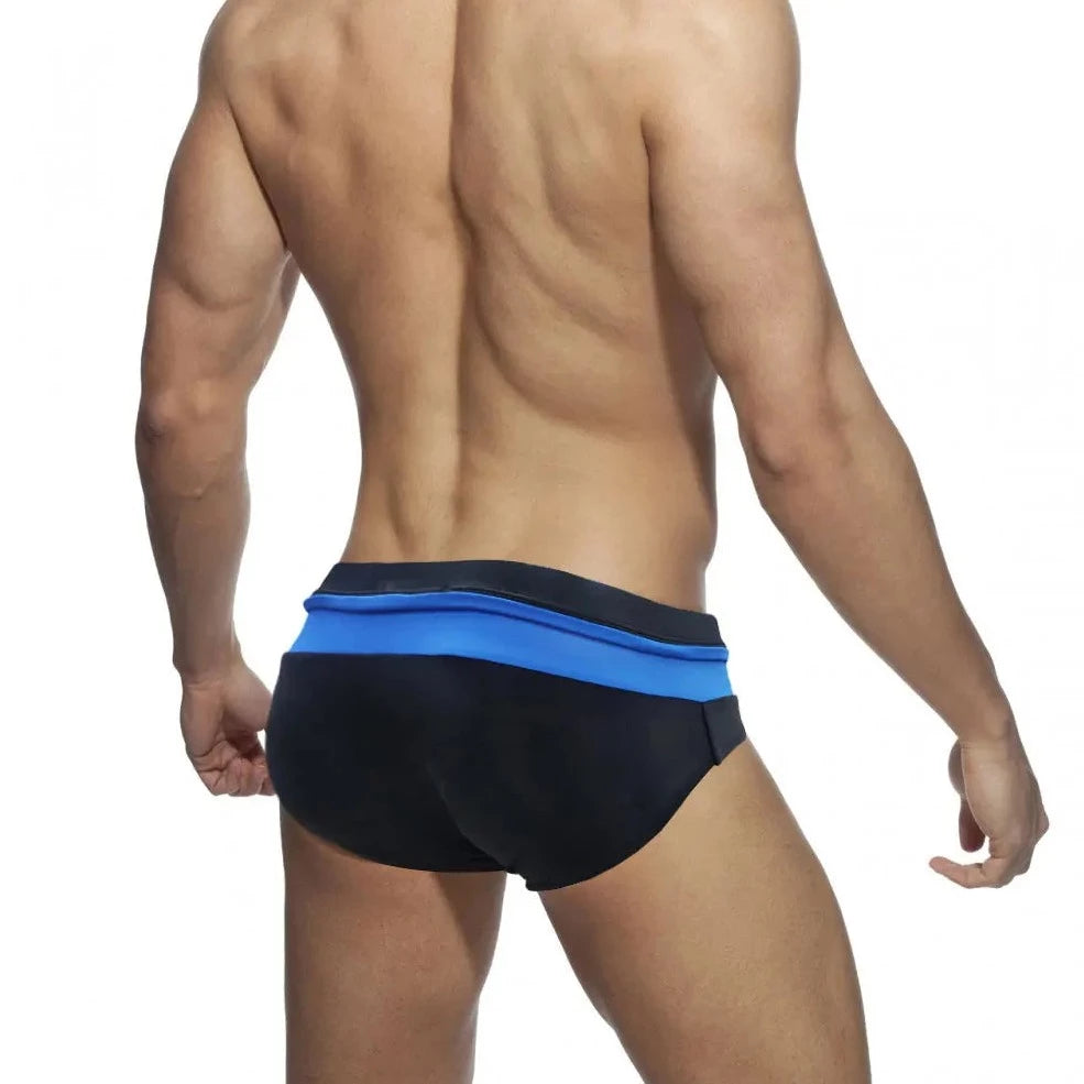 a sexy gay man in Black and Blue Men's Bowtie Zippered Swim Briefs - pridevoyageshop.com - gay men’s underwear and swimwear