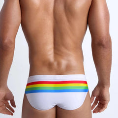 a hot gay man in white Men's Pride Ringaround Rainbow Swim Briefs - pridevoyageshop.com - gay men’s underwear and swimwear