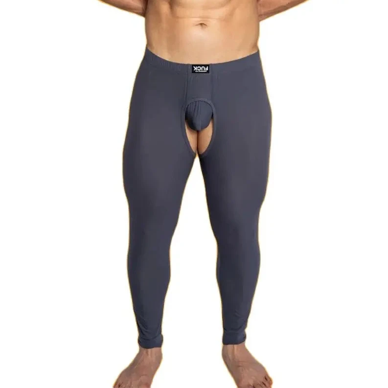 a hot man in dark gray DM Exhibition Tights - pridevoyageshop.com - gay men’s thights, leggings, and long underwear