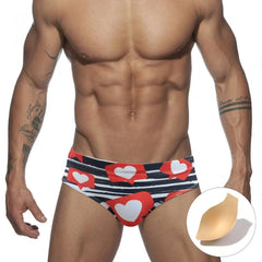 a hot gay man in Men's Heart Message Swim Briefs - pridevoyageshop.com - gay men’s underwear and swimwear