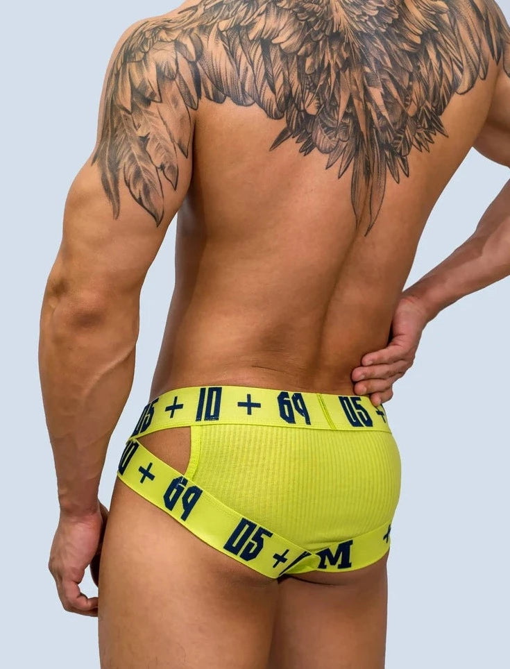 a hot gay man in yellow DM Sideshow Gay Briefs - pridevoyageshop.com - gay men’s underwear and swimwear