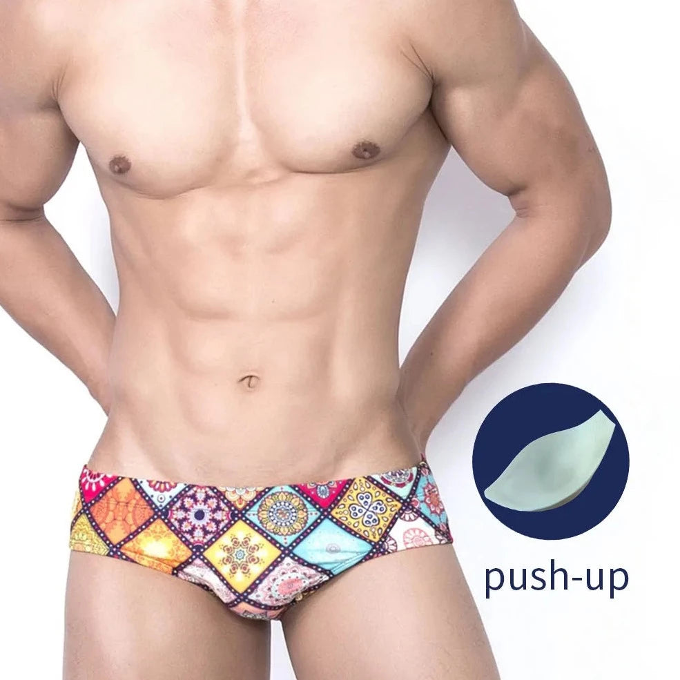 a sexy gay man in Men's Mosaic Patch Swim Briefs - pridevoyageshop.com - gay men’s underwear and swimwear