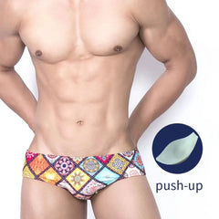 a sexy gay man in Men's Mosaic Patch Swim Briefs - pridevoyageshop.com - gay men’s underwear and swimwear