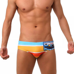 a hot gay man in Men's 80s Cassette Swim Briefs - pridevoyageshop.com - gay men’s underwear and swimwear