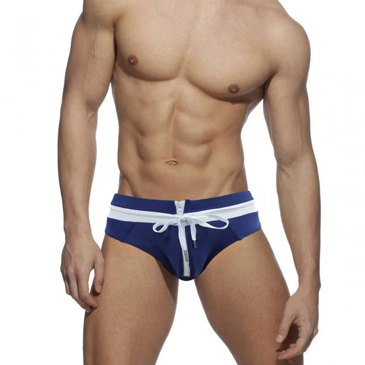 a sexy gay man in Navy Blue and white Men's Bowtie Zippered Swim Briefs - pridevoyageshop.com - gay men’s underwear and swimwear