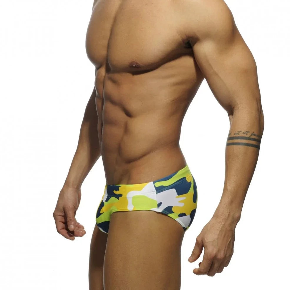 a sexy gay man in yellow Men's Camo Swim Briefs - pridevoyageshop.com - gay men’s underwear and swimwear