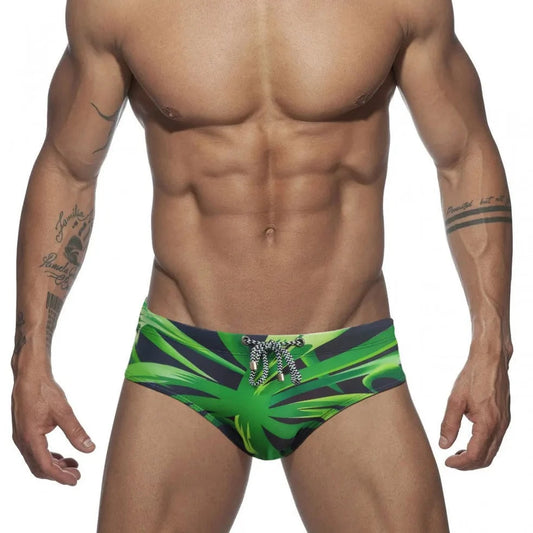 a hot gay man in Men's Green Leaf Swim Briefs - pridevoyageshop.com - gay men’s underwear and swimwear