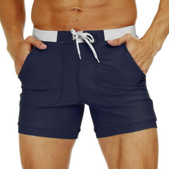 hot gay man in navy Gay Swimwear & Beachwear | Drawstring Boxer Swim Trunks - pridevoyageshop.com - gay men’s underwear and swimwear