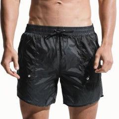 hot gay man in dark gray  Gay Swimwear & Beachwear | Desmiit See Through Board Shorts - pridevoyageshop.com - gay men’s underwear and swimwear