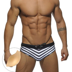 a hot gay man in black Sailor‘s Striped Bowtie Swim Briefs - pridevoyageshop.com - gay men’s underwear and swimwear