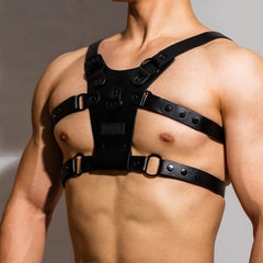 sexy gay man in Black Faux Leather Fetish Harness | Gay Harness- pridevoyageshop.com - gay men’s harness, lingerie and fetish wear