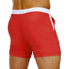 hot gay man in red Gay Swimwear & Beachwear | Drawstring Boxer Swim Trunks - pridevoyageshop.com - gay men’s underwear and swimwear