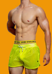 a hot gay man in Fluorescent Green Men's See-Thru Strap Shorts - Men's Activewear, gym short, sport shorts, running shorts- pridevoyageshop.com