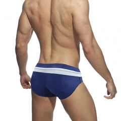 a sexy gay man in Navy Blue and white Men's Bowtie Zippered Swim Briefs - pridevoyageshop.com - gay men’s underwear and swimwear