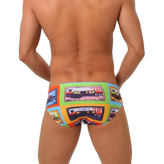 a hot gay man in Men's 80s Cassette Swim Briefs - pridevoyageshop.com - gay men’s underwear and swimwear