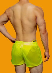 a hot gay man in Fluorescent Green Men's See-Thru Strap Shorts - Men's Activewear, gym short, sport shorts, running shorts- pridevoyageshop.com