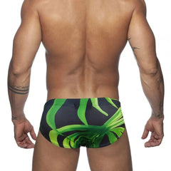 a hot gay man in Men's Green Leaf Swim Briefs - pridevoyageshop.com - gay men’s underwear and swimwear
