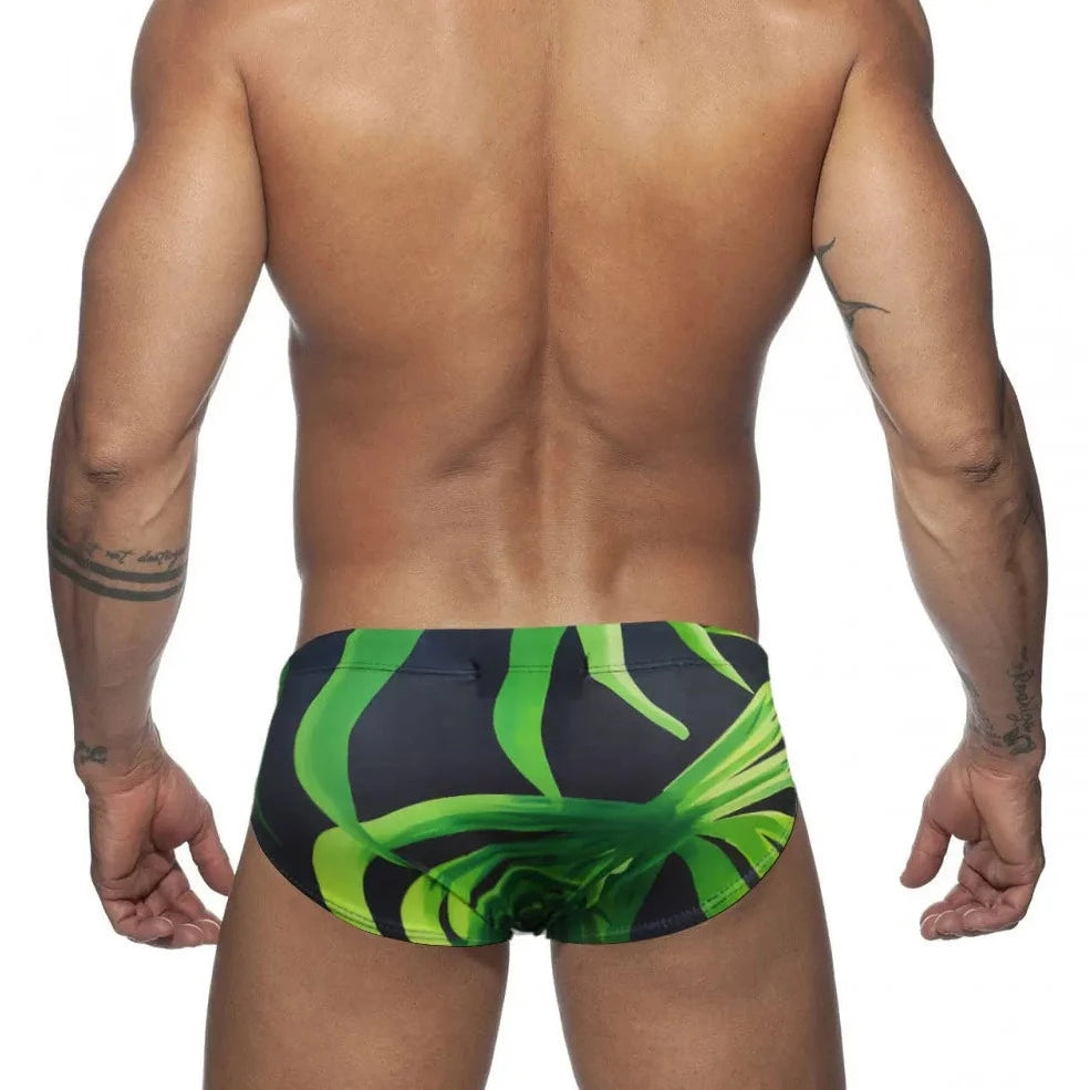 a hot gay man in Men's Green Leaf Swim Briefs - pridevoyageshop.com - gay men’s underwear and swimwear