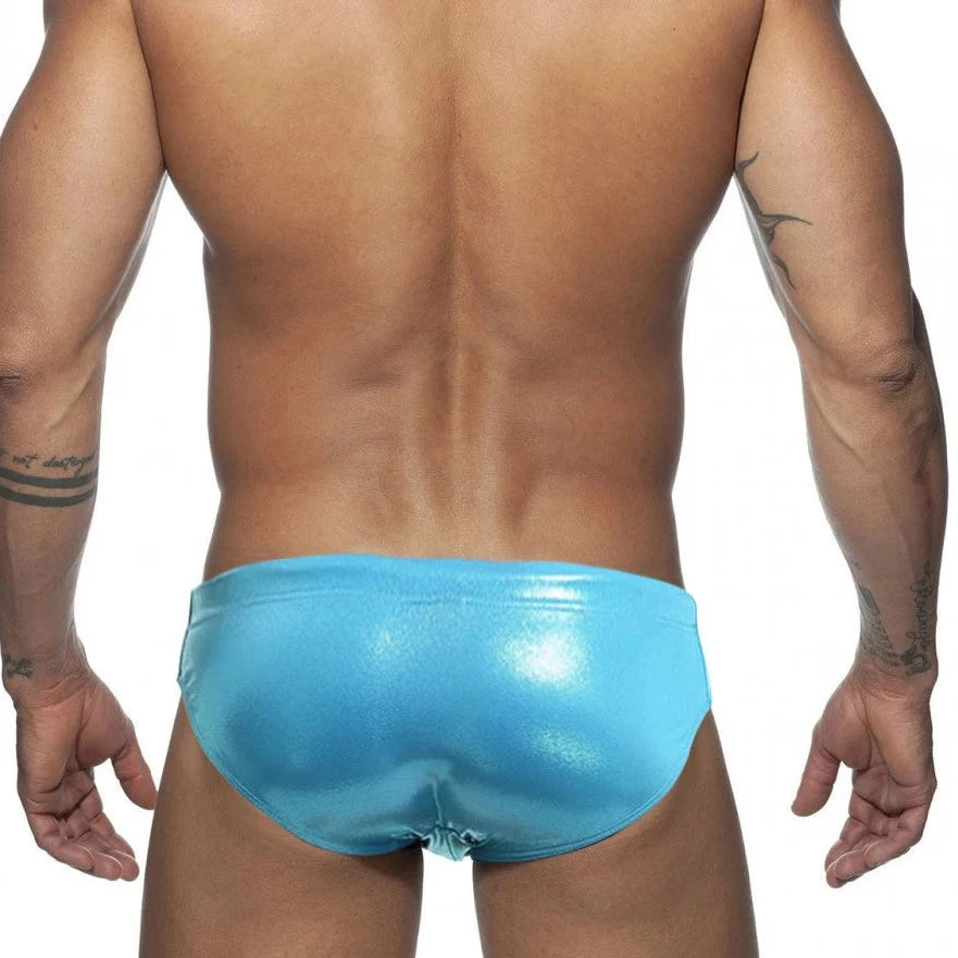 a hot gay man in blue Glide Metallic Swim Briefs - pridevoyageshop.com - gay men’s underwear and swimwear