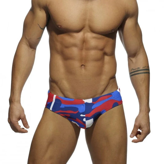a sexy gay man in red Men's Camo Swim Briefs - pridevoyageshop.com - gay men’s underwear and swimwear