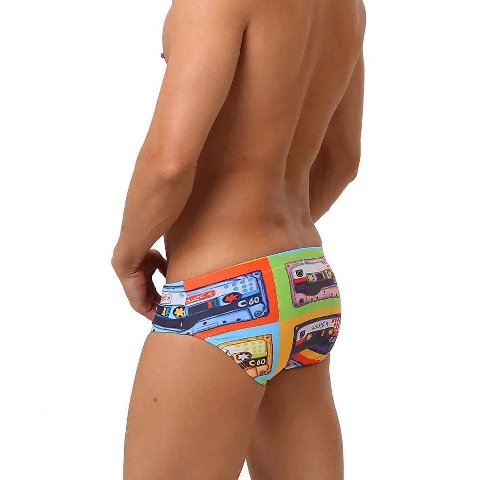 a hot gay man in Men's 80s Cassette Swim Briefs - pridevoyageshop.com - gay men’s underwear and swimwear