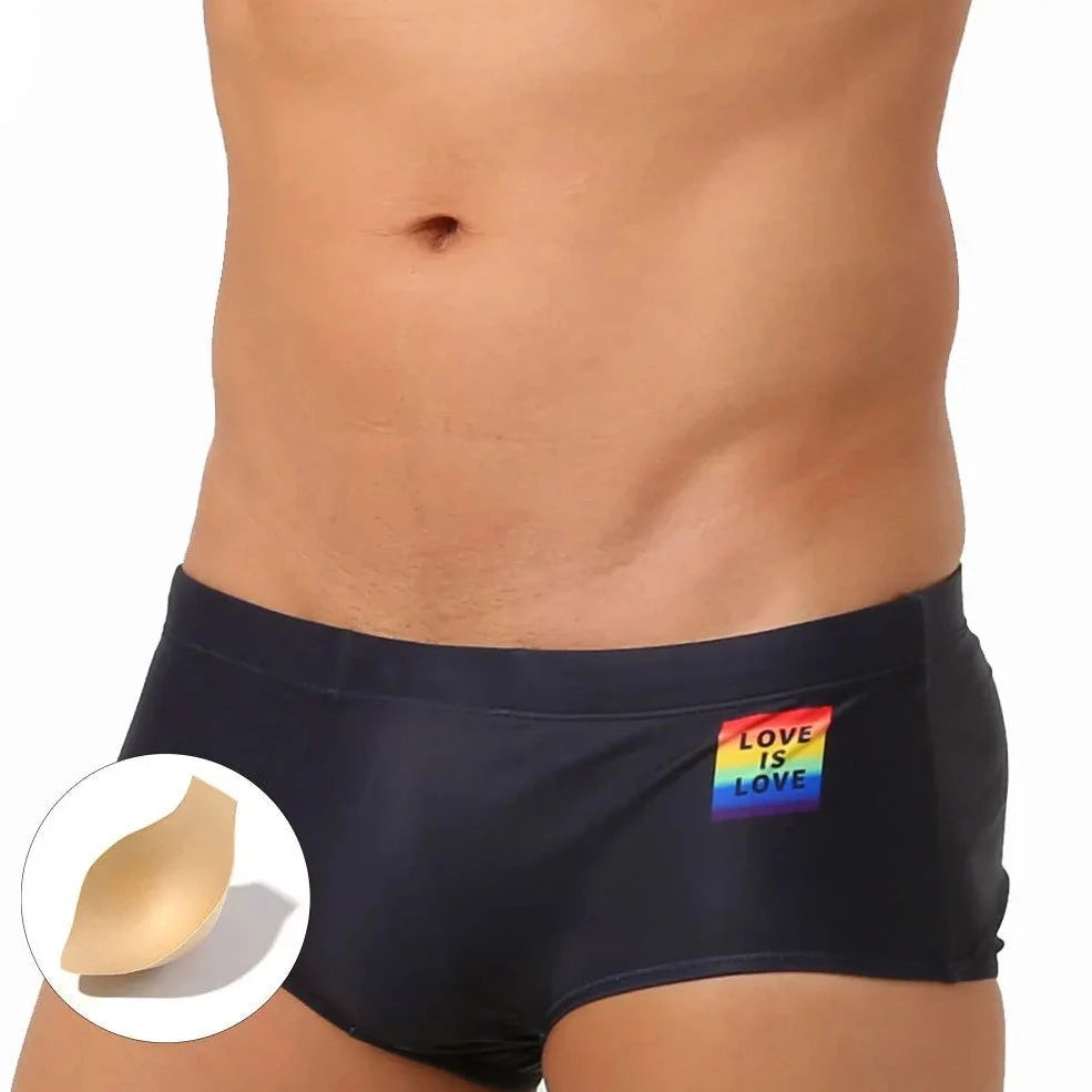 a hot gay in black Love Is Love Pride Swim Trunks - pridevoyageshop.com - gay men’s underwear and swimwear