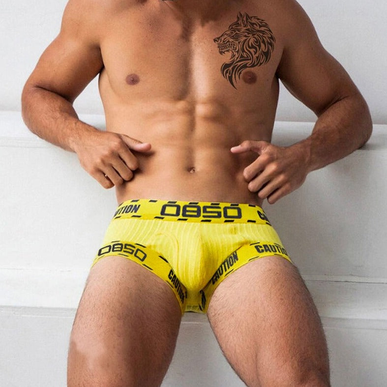 front of a man in Yellow OBSO Men's Low Rise Boxer Briefs Underwear - pridevoyageshop.com - gay men’s underwear and swimwear