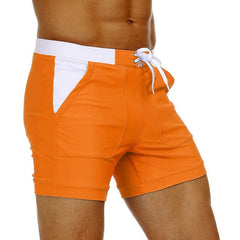 hot gay man in orange Gay Swimwear & Beachwear | Drawstring Boxer Swim Trunks - pridevoyageshop.com - gay men’s underwear and swimwear