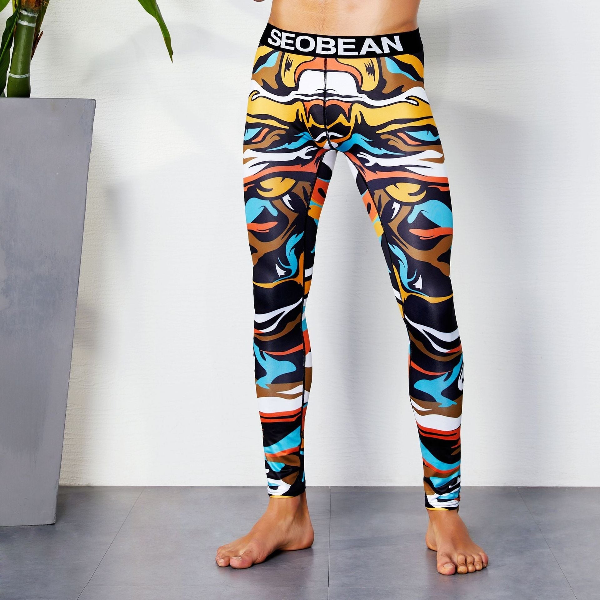 sexy gay man in Earth Form Gay Leggings | Colorful Print Elemental Workout Leggings - pridevoyageshop.com - gay men’s underwear and activewear