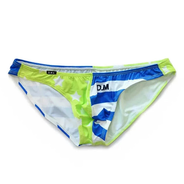 a hot gay man in Green Blue DESMIIT Stars + Stripes Ultra Low Rise Swim Briefs - pridevoyageshop.com - gay men’s underwear and swimwear