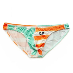 a hot gay man in Green Orange DESMIIT Stars + Stripes Ultra Low Rise Swim Briefs - pridevoyageshop.com - gay men’s underwear and swimwear