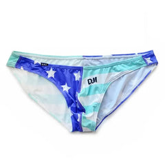 a hot gay man in Blue Sky Blue DESMIIT Stars + Stripes Ultra Low Rise Swim Briefs - pridevoyageshop.com - gay men’s underwear and swimwear