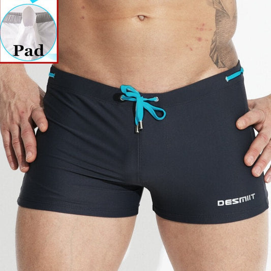 sexy gay man in dark gray Gay Swimwear | Sexy Mens Pouch Square Cut Swim Trunks - pridevoyageshop.com - gay men’s underwear and swimwear