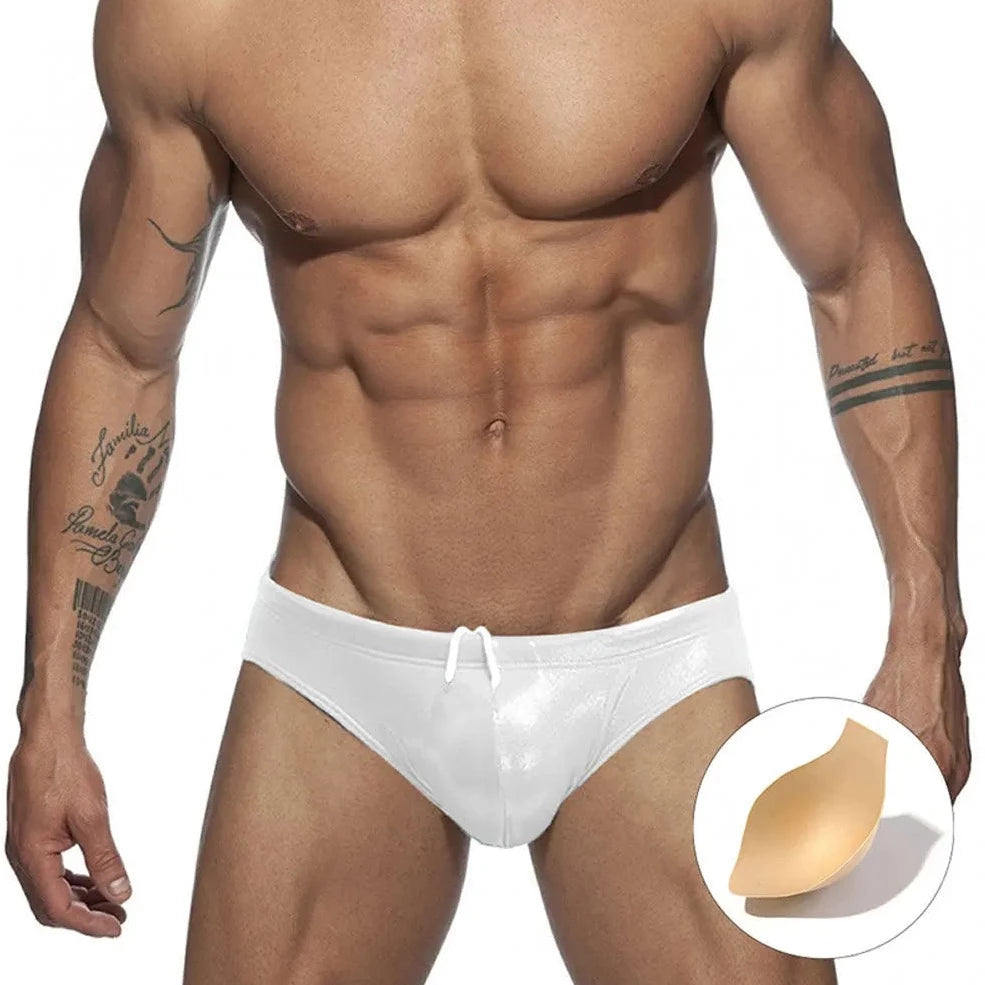 a hot gay man in silver Glide Metallic Swim Briefs - pridevoyageshop.com - gay men’s underwear and swimwear