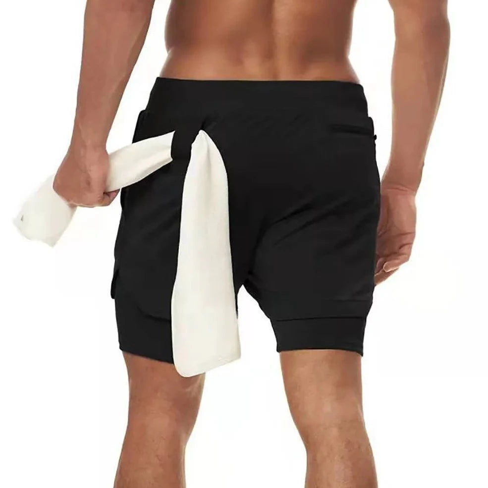 a muscle guy in black Men's Double Layered Hidden Pocket Workout Shorts - pridevoyageshop.com - gay men’s underwear and swimwear