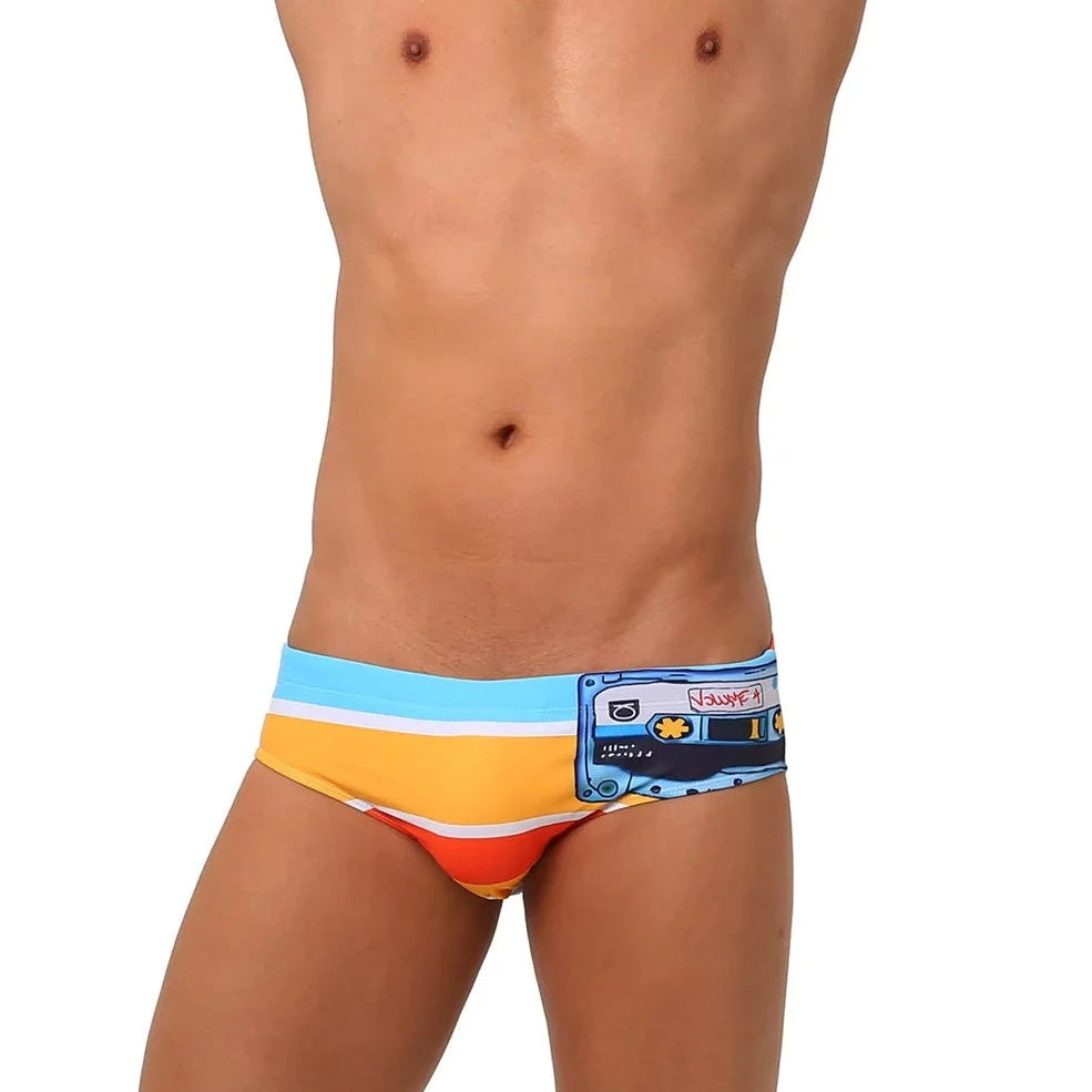 a hot gay man in Men's 80s Cassette Swim Briefs - pridevoyageshop.com - gay men’s underwear and swimwear