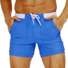 hot gay man in Royal Blue Gay Swimwear & Beachwear | Drawstring Boxer Swim Trunks - pridevoyageshop.com - gay men’s underwear and swimwear