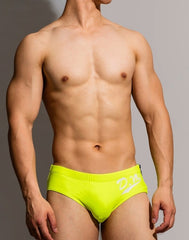 hot gay man in Fluorescent Green Gay Swimwear | DM Zipper Swim Briefs- pridevoyageshop.com - gay men’s underwear and swimwear