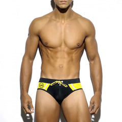 a hot gay man in black Men's Two-toned Bold Swim Briefs - pridevoyageshop.com - gay men’s underwear and swimwear