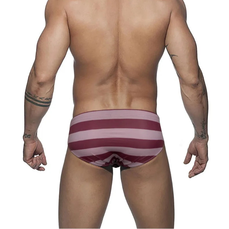 Skin pink Men’s Spank Me Striped Swim Briefs - pridevoyageshop.com - gay men’s sexy swim briefs, trunks, board shorts, and bikinis