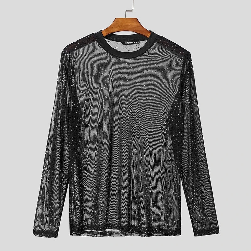 Twinkle Twunk Mesh Long Sleeve Black color sheer sparkle mesh long sleeve top displayed flat pridevoyageshopcom gay mens gym tank tops mesh tank tops clubwear fashion tops and activewear