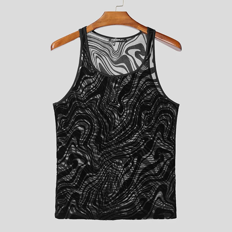 a flat lay of Black Disco Mirage Mesh Top - pridevoyageshop.com - gay men's fashion, clubwear, party outfit
