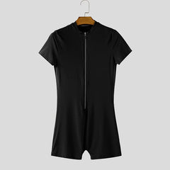 a flat lay of Black Ramrod V‑Zip Bodysuit - pridevoyageshop.com - gay men's lingerie, bodywear, fetish wear
