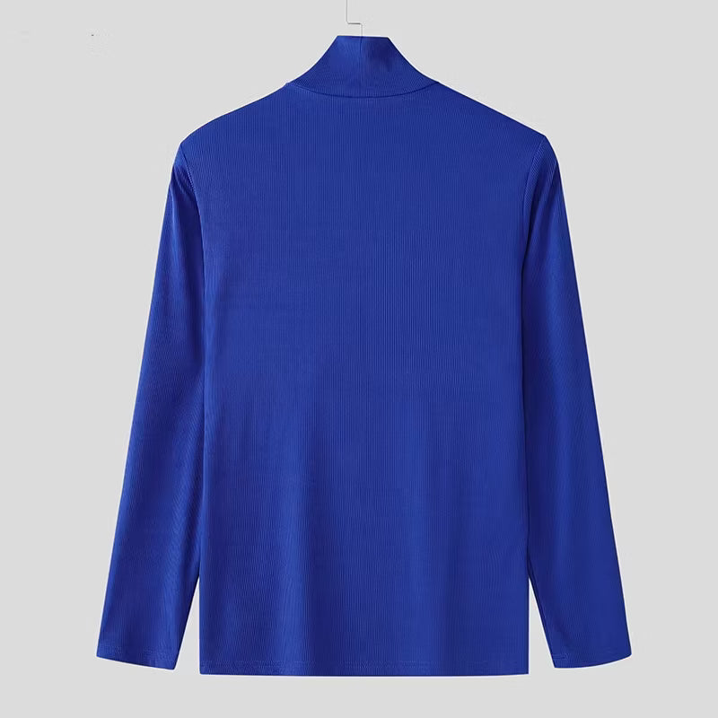 a flat lay of Blue Charli Cutout Turtleneck - pridevoyageshop.com - gay men's fashion, clubwear, party outfit
