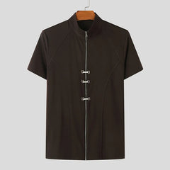 a flat lay of Brown Castro Catwalk Zip Tee - pridevoyageshop.com - gay men's fashion, clubwear, party outfit
