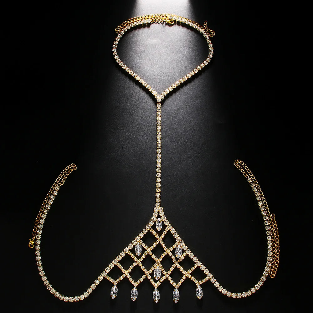 a flat lay of Gold Chelsea Showboy Crystal Body Chain - pridevoyageshop.com - gay men's harness, fetish gear, rave outfit
