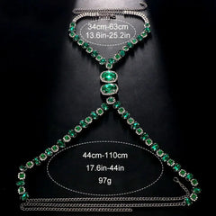 a flat lay of Gunmetal Emerald City Showgirl Gem Harness - pridevoyageshop.com - gay men's harness, fetish gear, rave outfit
