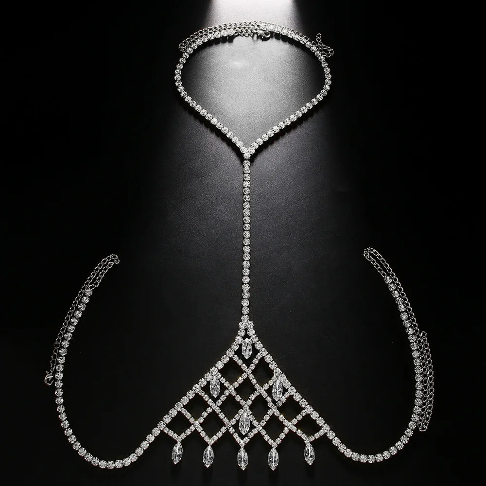 a flat lay of Silver Chelsea Showboy Crystal Body Chain - pridevoyageshop.com - gay men's harness, fetish gear, rave outfit
