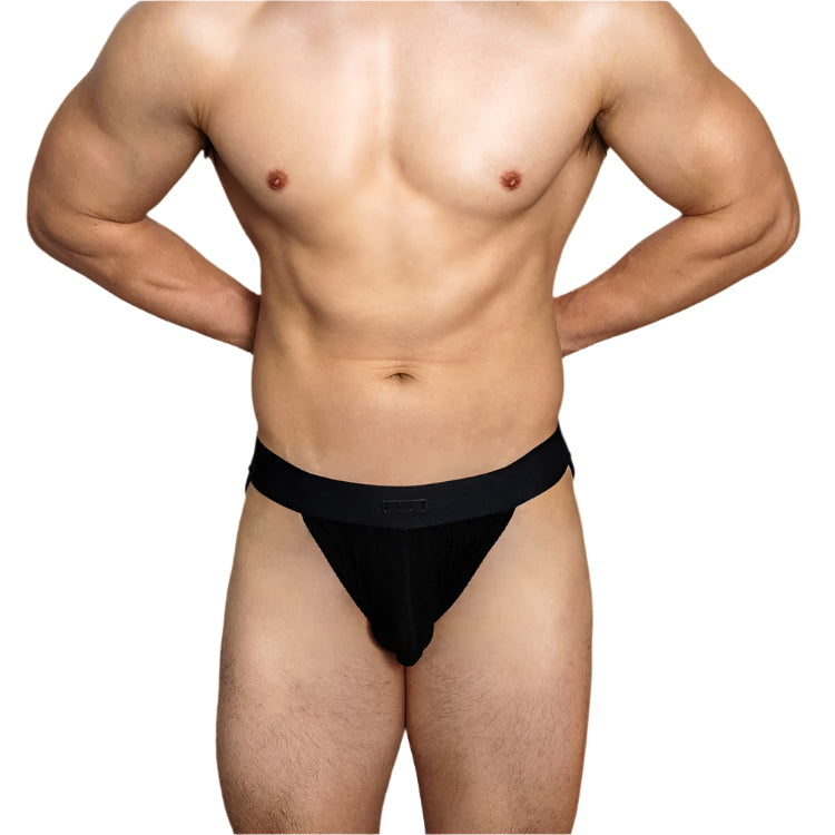 a hot man in black DM Men’s “Ribbed Master” Full-Coverage Brief - pridevoyageshop.com - gay men’s thongs, boxers, briefs and jockstraps