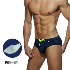 a hot man in dark blue Men's Ass First Aid Swim Briefs with pad - pridevoyageshop.com - gay men’s sexy swim briefs, trunks, board shorts, and bikinis